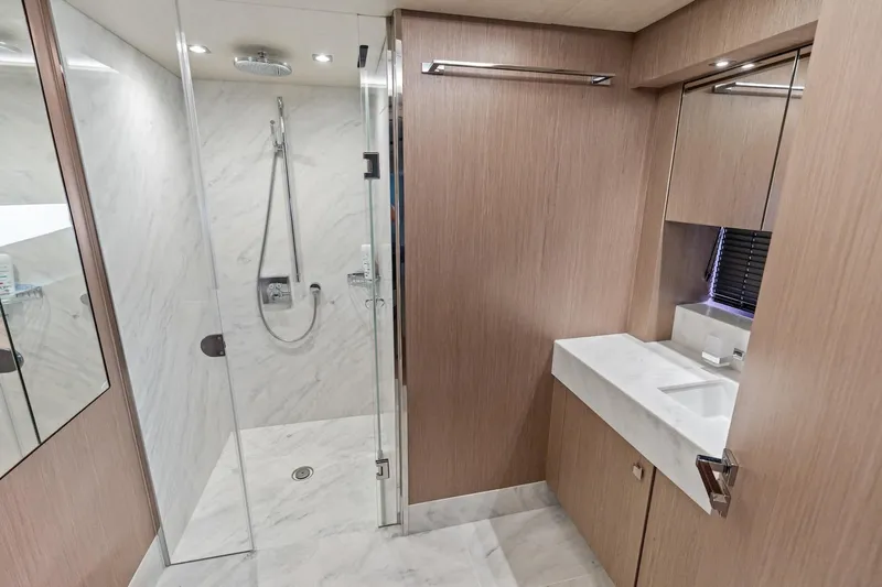 Aqua Vista Yacht Photos Pics Luxurious bathroom on 2019 Sunseeker 86 Yacht with marble shower and modern fixtures.