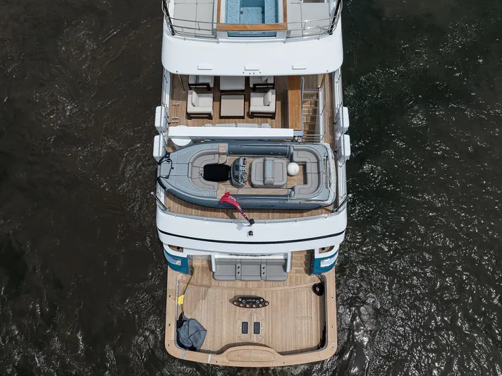 Uptight Yacht Photos Pics Aerial view of 2022 Cantiere Delle Marche Darwin 106 yacht with tender on deck.
