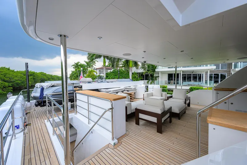 Uptight Yacht Photos Pics Luxurious 2022 Cantiere Delle Marche Darwin 106 yacht deck with modern seating and sleek design.