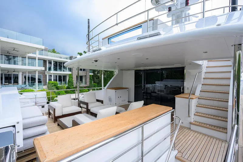 Uptight Yacht Photos Pics Luxurious 2022 Cantiere Delle Marche Darwin 106 yacht deck with modern seating and elegant design.