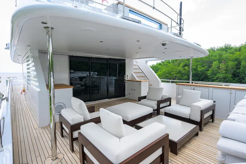 Uptight Yacht Photos Pics Luxurious 2022 Cantiere Delle Marche Darwin 106 yacht deck with elegant seating area.