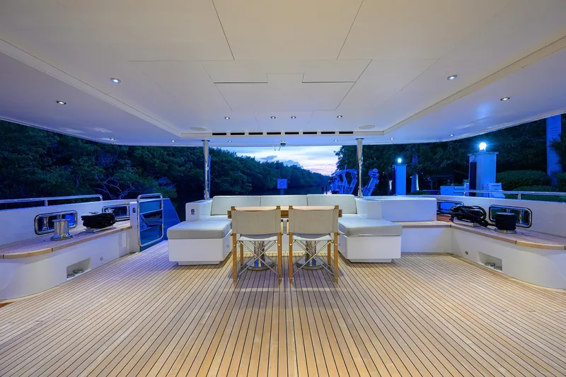 Uptight Yacht Photos Pics Luxurious deck of 2022 Cantiere Delle Marche Darwin 106 yacht at sunset.