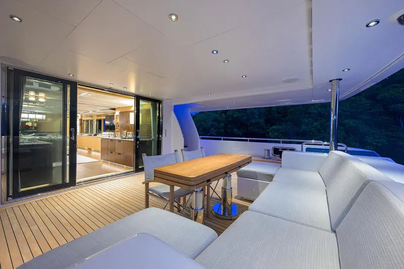 Uptight Yacht Photos Pics Luxurious 2022 Cantiere Delle Marche Darwin 106 yacht interior with elegant seating and dining area.