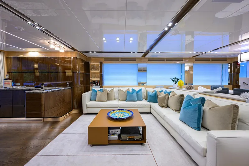 Uptight Yacht Photos Pics Luxurious interior of 2022 Cantiere Delle Marche Darwin 106 yacht with modern decor and spacious seating.