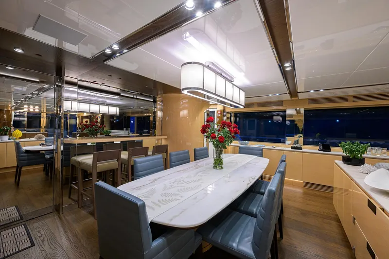 Uptight Yacht Photos Pics Luxurious dining area on 2022 Cantiere Delle Marche Darwin 106 yacht, featuring elegant decor.