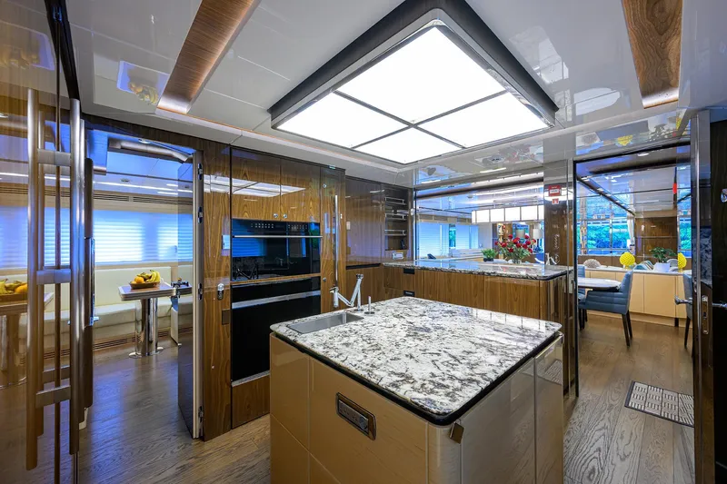 Uptight Yacht Photos Pics Luxurious interior of 2022 Cantiere Delle Marche Darwin 106 yacht kitchen.