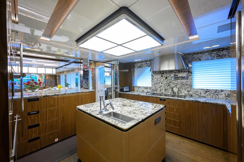 Uptight Yacht Photos Pics Luxurious kitchen interior of 2022 Cantiere Delle Marche Darwin 106 yacht.