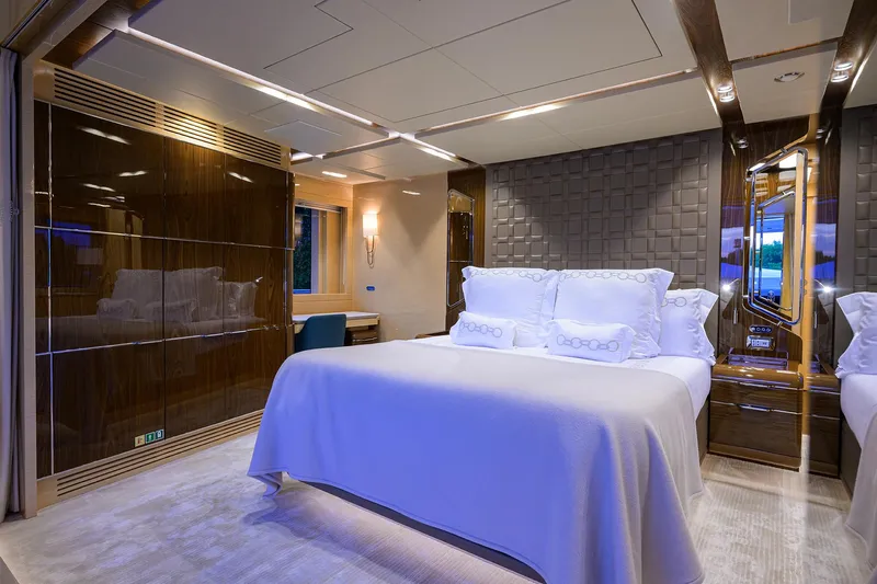 Uptight Yacht Photos Pics Luxurious bedroom interior of 2022 Cantiere Delle Marche Darwin 106 yacht.