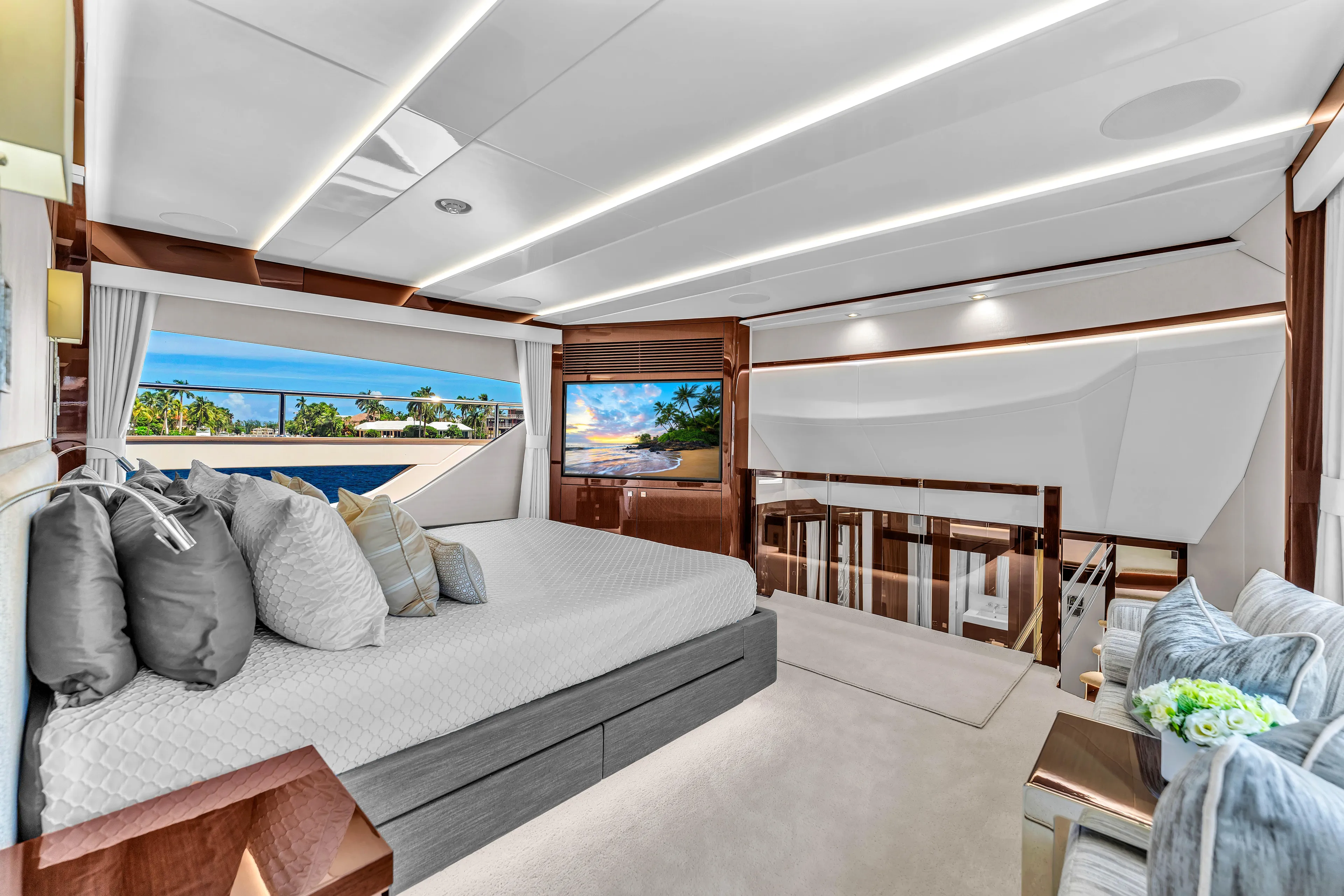 Karillian & Company Yacht Photos Pics Luxurious interior of 2018 Sunseeker 95 Yacht with elegant bedroom and scenic window view.
