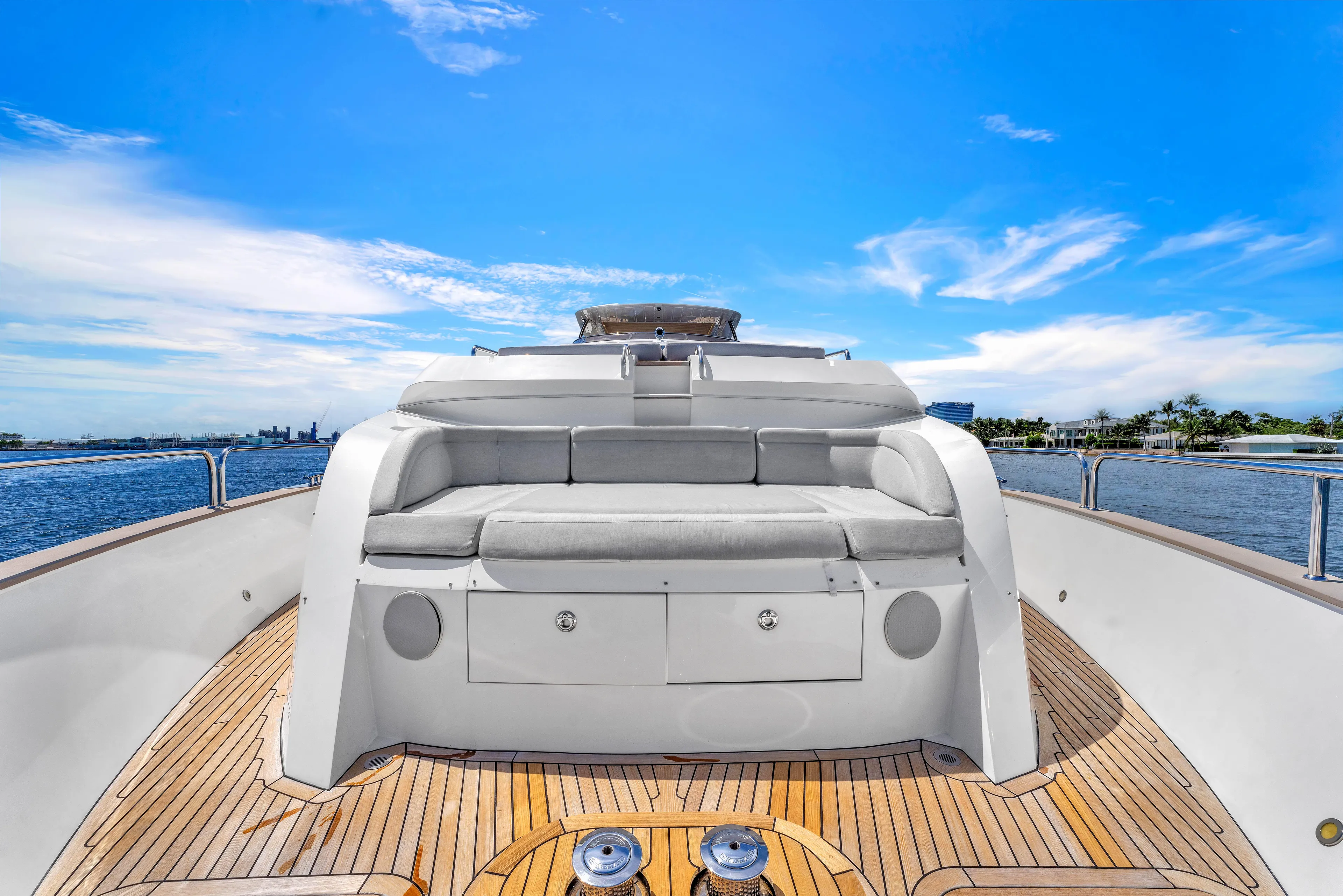 Karillian & Company Yacht Photos Pics Luxurious 2018 Sunseeker 95 Yacht deck with plush seating and ocean view.