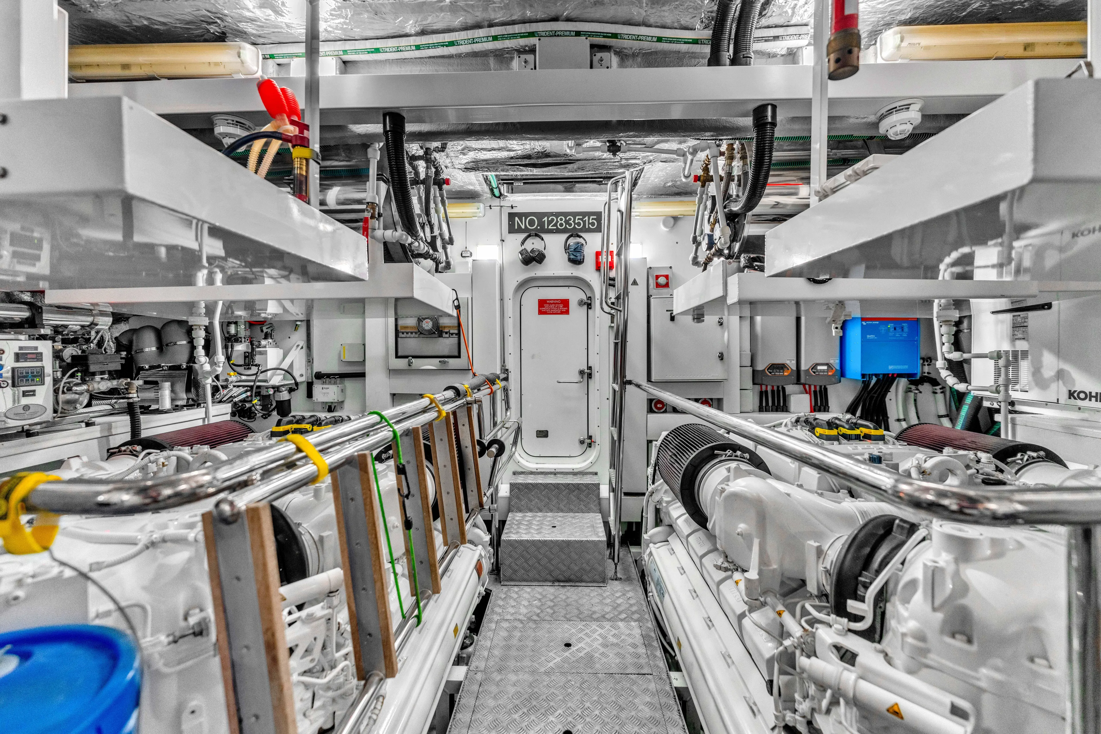 Karillian & Company Yacht Photos Pics Engine room of 2018 Sunseeker 95 Yacht, showcasing advanced machinery and equipment.