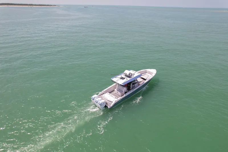 My Mermaid Yacht Photos Pics 2020 Nor-Tech 390 Sport Center Console cruising on open water.