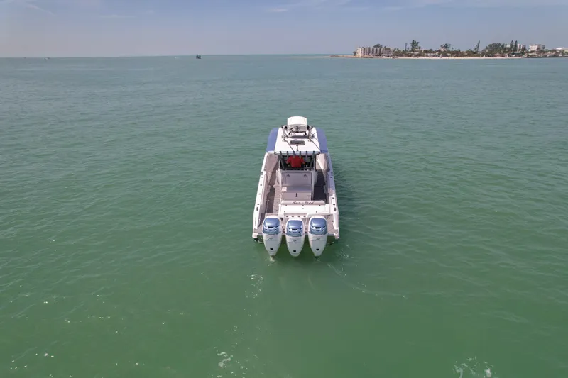 My Mermaid Yacht Photos Pics 2020 Nor-Tech 390 Sport Center Console boat on open water, rear view.