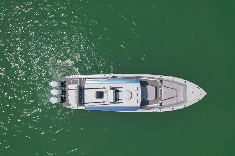 My Mermaid Yacht Photos Pics Aerial view of 2020 Nor-Tech 390 Sport Center Console boat on green water.