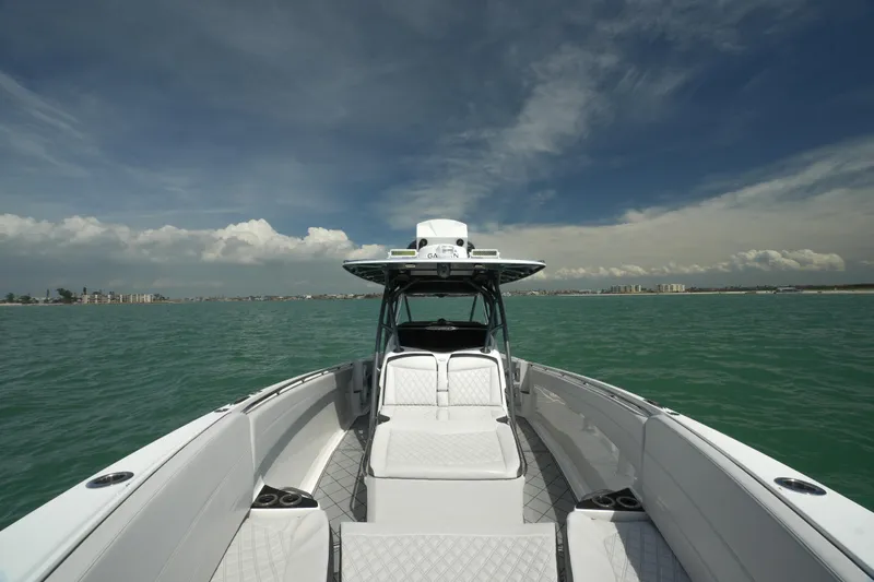 My Mermaid Yacht Photos Pics 2020 Nor-Tech 390 Sport Center Console boat on open water under a clear sky.