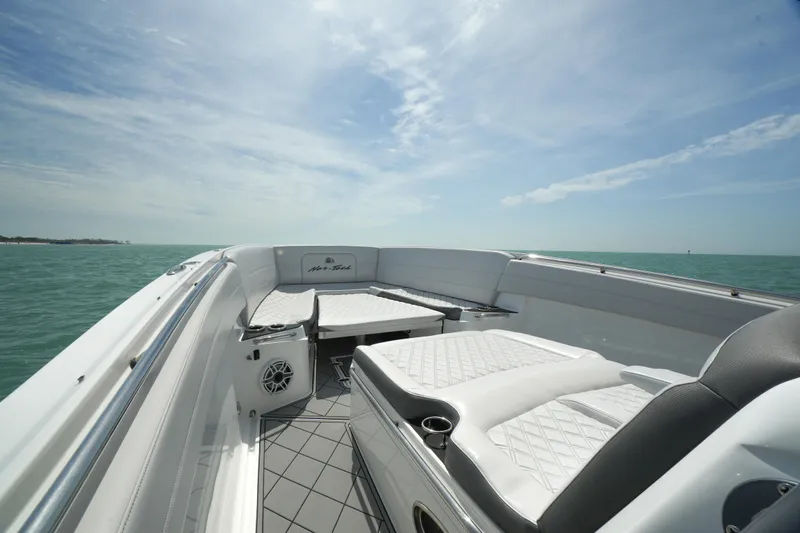 My Mermaid Yacht Photos Pics 2020 Nor-Tech 390 Sport Center Console boat with luxurious seating on open water.