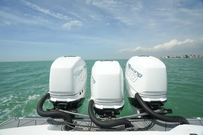 My Mermaid Yacht Photos Pics 2020 Nor-Tech 390 Sport Center Console with triple outboard engines on open water.