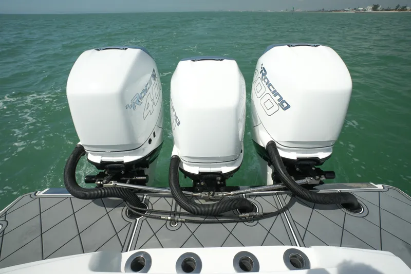 My Mermaid Yacht Photos Pics 2020 Nor-Tech 390 Sport Center Console with triple outboard engines on open water.