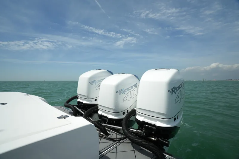 My Mermaid Yacht Photos Pics 2020 Nor-Tech 390 Sport Center Console with triple outboard engines on open water.