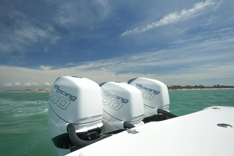 My Mermaid Yacht Photos Pics 2020 Nor-Tech 390 Sport Center Console with triple outboard engines on open water.