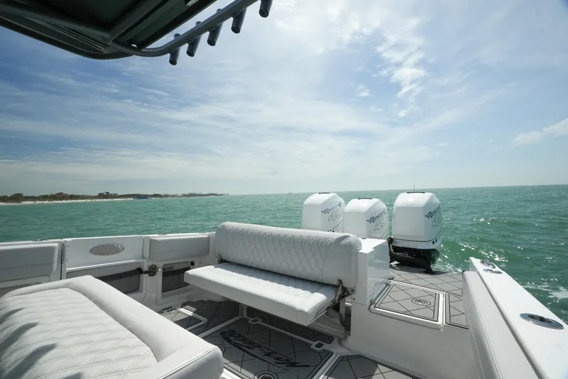 My Mermaid Yacht Photos Pics 2020 Nor-Tech 390 Sport Center Console on open water, featuring luxurious seating and triple engines.