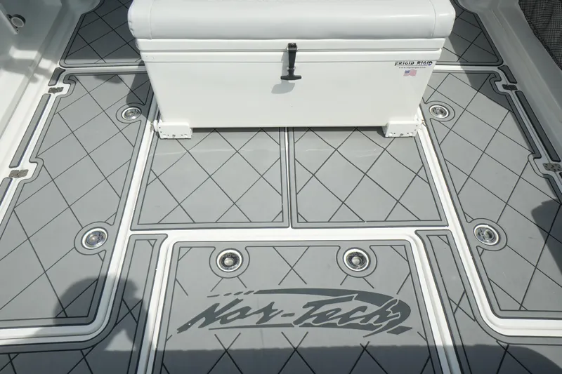 My Mermaid Yacht Photos Pics 2020 Nor-Tech 390 Sport Center Console deck with custom flooring and storage box.