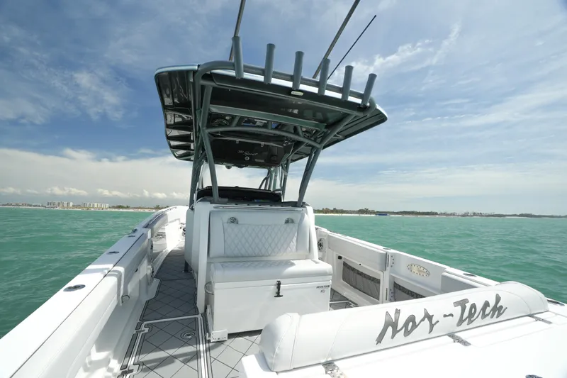 My Mermaid Yacht Photos Pics 2020 Nor-Tech 390 Sport Center Console boat on open water, showcasing sleek design and spacious deck.