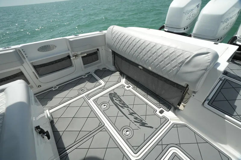 My Mermaid Yacht Photos Pics 2020 Nor-Tech 390 Sport Center Console boat interior with cushioned seating and ocean view.