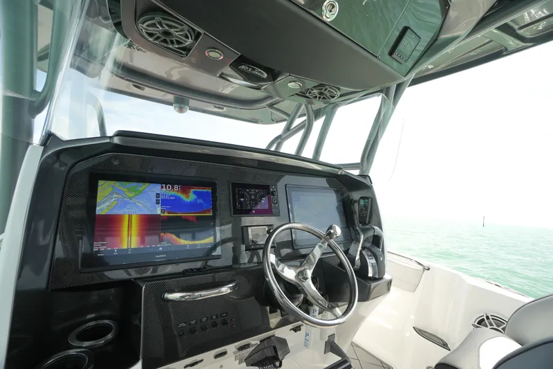 My Mermaid Yacht Photos Pics 2020 Nor-Tech 390 Sport Center Console dashboard with advanced navigation displays and controls.