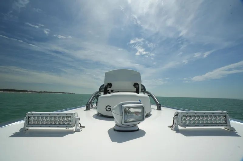 My Mermaid Yacht Photos Pics 2020 Nor-Tech 390 Sport Center Console boat on open water under a clear sky.