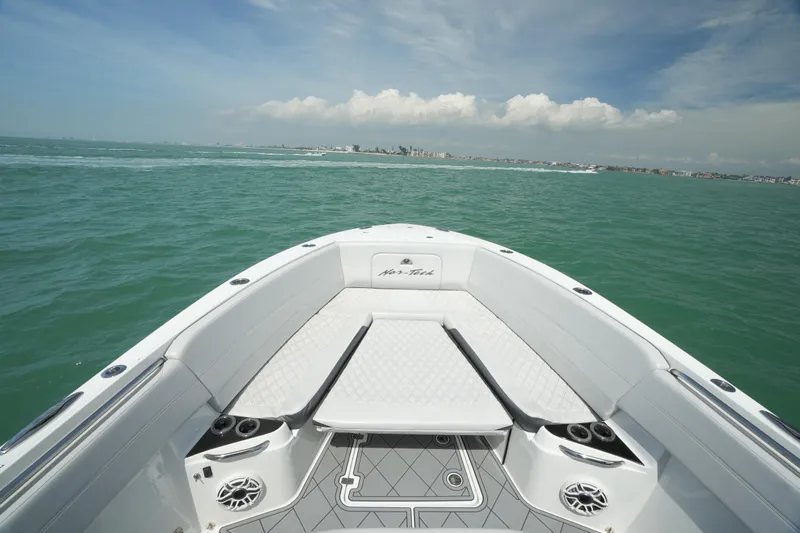 My Mermaid Yacht Photos Pics Nor-Tech 390 Sport Center Console 2020 on open water, showcasing sleek design and spacious deck.
