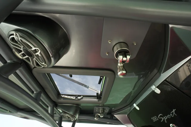 My Mermaid Yacht Photos Pics 2020 Nor-Tech 390 Sport Center Console interior with speaker and hatch details.