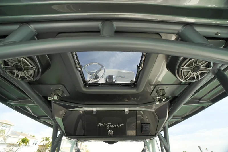 My Mermaid Yacht Photos Pics 2020 Nor-Tech 390 Sport Center Console interior with speakers and steering wheel view.