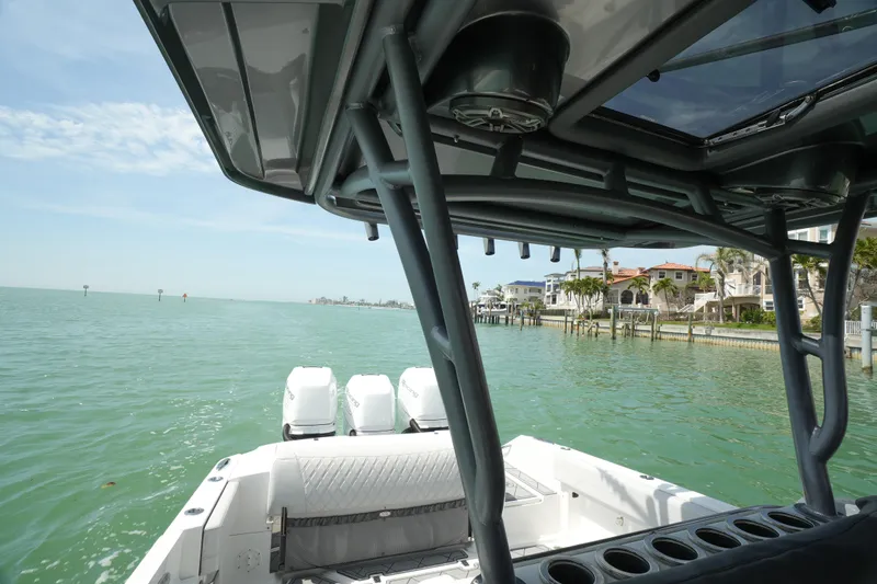 My Mermaid Yacht Photos Pics 2020 Nor-Tech 390 Sport Center Console on calm waters near coastal homes.