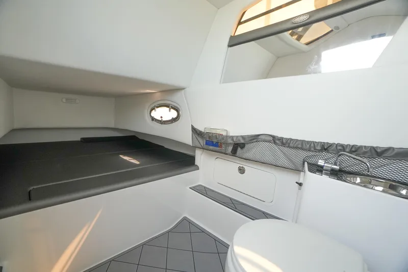 My Mermaid Yacht Photos Pics 2020 Nor-Tech 390 Sport Center Console cabin interior with bed and toilet.