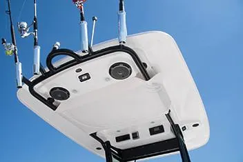  Yacht Photos Pics Manufacturer Provided Image: Everglades 273 Center Console 2020 boat with fishing rods and speakers.