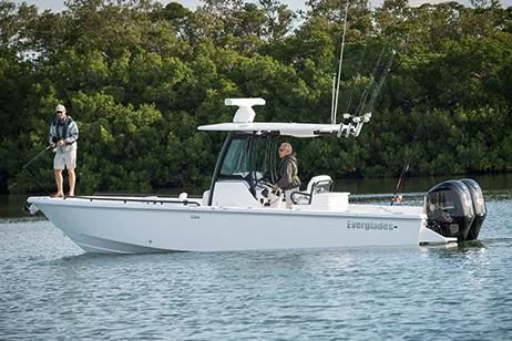  Yacht Photos Pics Manufacturer Provided Image: 2020 Everglades 273 Center Console boat on water with two people fishing.