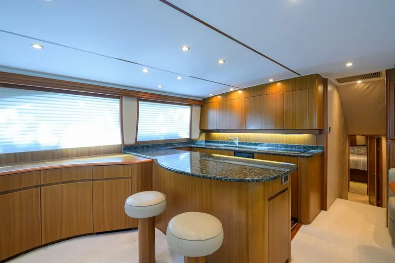 Pryorities Yacht Photos Pics Luxurious interior of 2008 Viking 60 Convertible yacht with modern kitchen design.