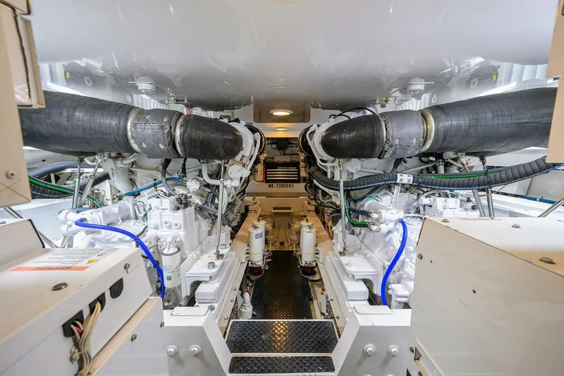 Pryorities Yacht Photos Pics Engine room of 2008 Viking 60 Convertible yacht, showcasing dual engines and mechanical systems.