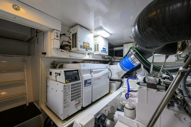 Pryorities Yacht Photos Pics Engine room of 2008 Viking 60 Convertible yacht with Cummins Onan generator.