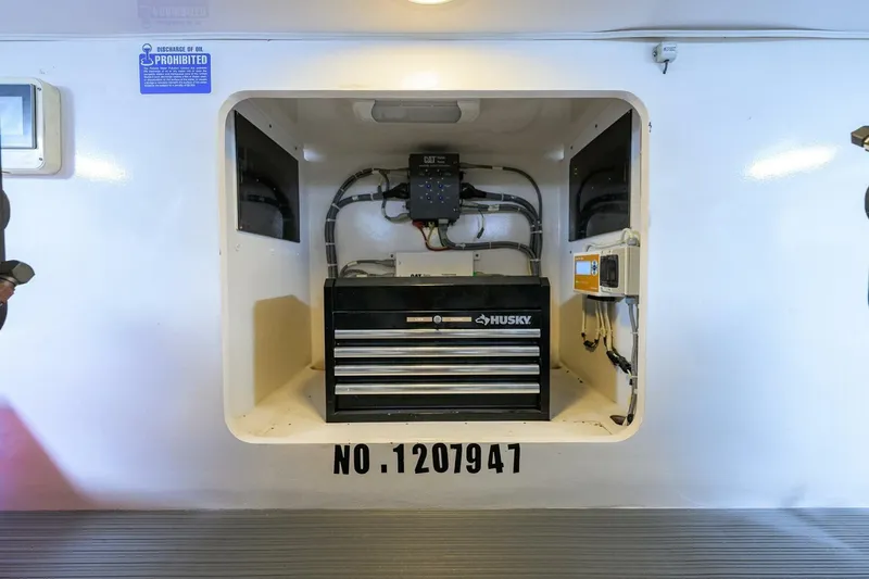 Pryorities Yacht Photos Pics Storage compartment on a 2008 Viking 60 Convertible boat with Husky tool chest.