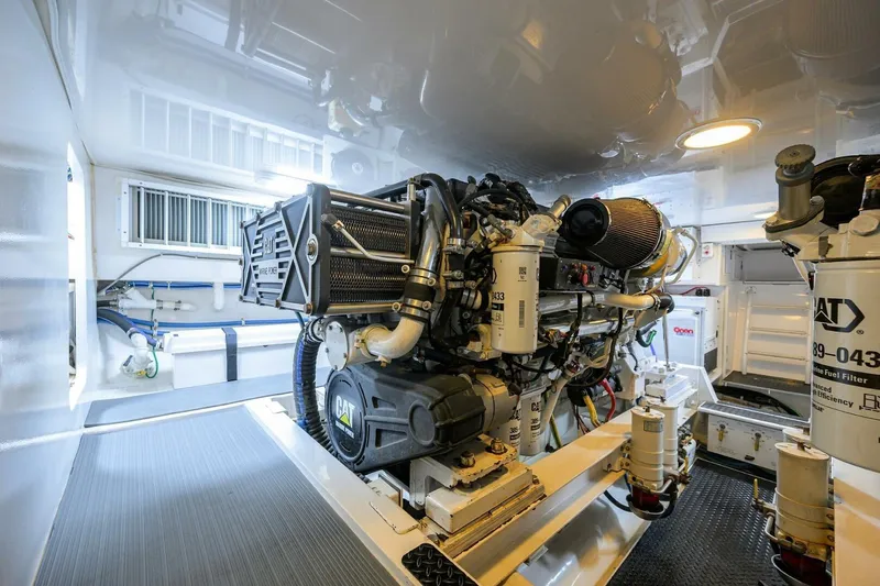 Pryorities Yacht Photos Pics Engine room of 2008 Viking 60 Convertible yacht, featuring CAT marine engine.