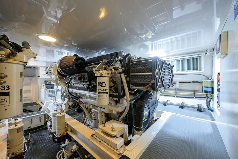 Pryorities Yacht Photos Pics Engine room of 2008 Viking 60 Convertible yacht, featuring CAT marine engine.