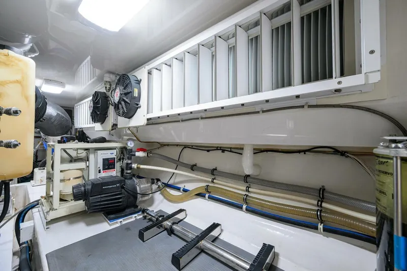 Pryorities Yacht Photos Pics Engine room of 2008 Viking 60 Convertible yacht with mechanical equipment and ventilation system.