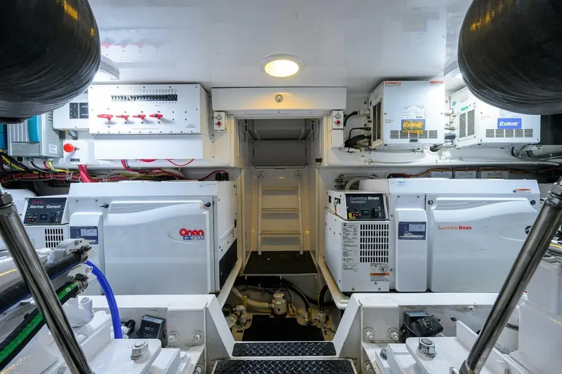 Pryorities Yacht Photos Pics Engine room of 2008 Viking 60 Convertible yacht with Cummins Onan generators.