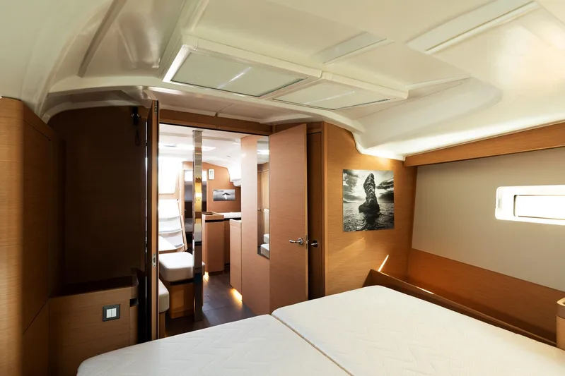 Ssy 01 Yacht Photos Pics Interior of 2021 Jeanneau Sun Odyssey 440 yacht, featuring modern wood finish and cozy cabin.