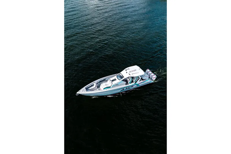  Yacht Photos Pics Aerial view of 2025 AMP 443 speedboat cruising on open water.
