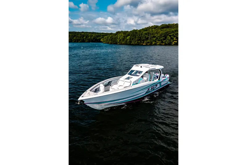  Yacht Photos Pics Modern AMP 443 boat cruising on a serene lake, 2025 model.