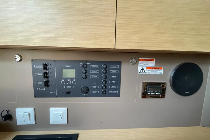 Moonshadow Yacht Photos Pics Control panel of a 2016 Beneteau Oceanis 38 sailboat interior.