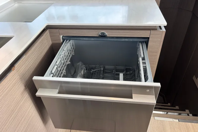 Faste Yacht Photos Pics Open dishwasher drawer in modern kitchen on Leopard 52, 2025 model yacht.